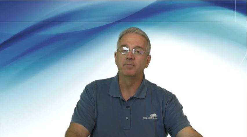 old man in front of blue screen